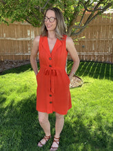 Load image into Gallery viewer, Fabric Content: 70% Rayon, 30% Linen Tomato colored Knee length Sleeveless Dress with V-neck, tie waist and Button front
